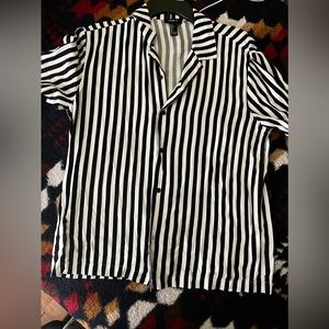 Black and white stripped button up shirt.